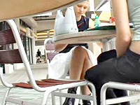 What a shame! This teen looks so gorgeous but she is sitting in not a very good way – with her legs widely stretched upskirt under the table